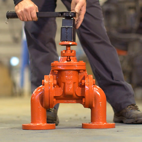 2" Socket Ratchet Wrench Being Used On Valve In Warehouse